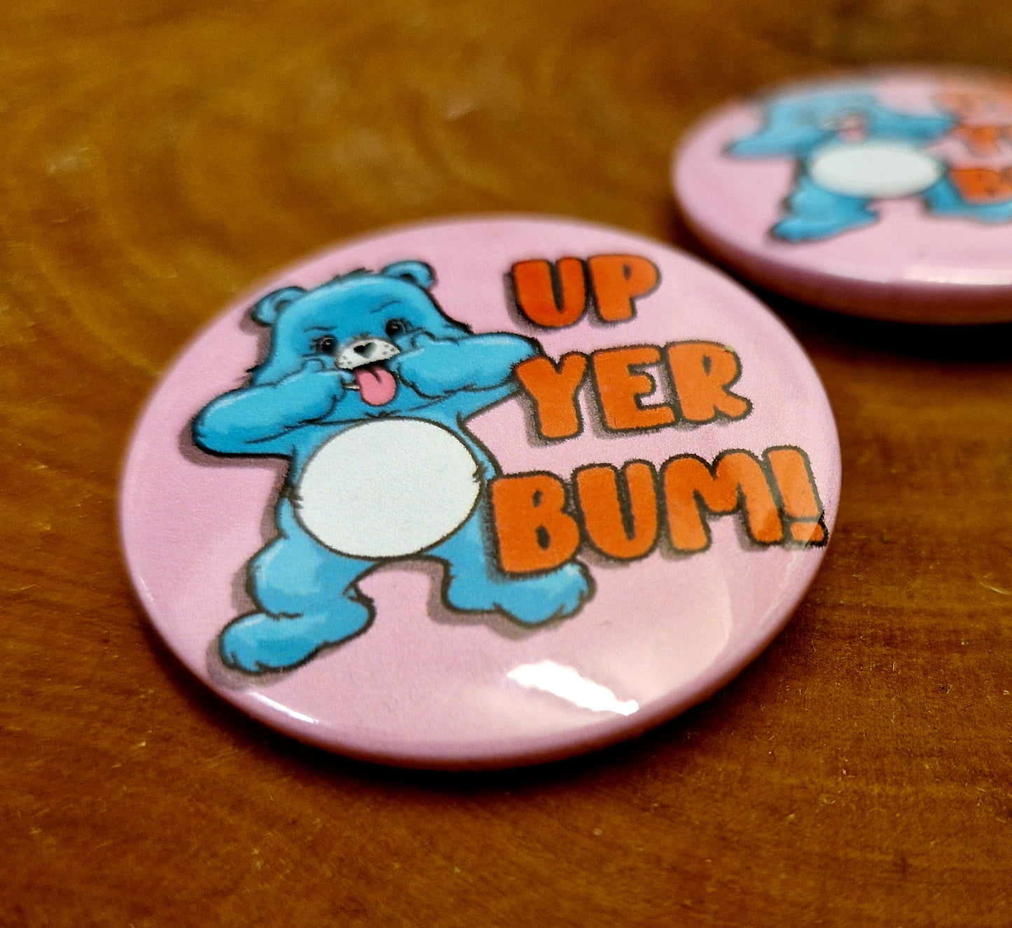 Retro badge - Care Bear "up ya bum"